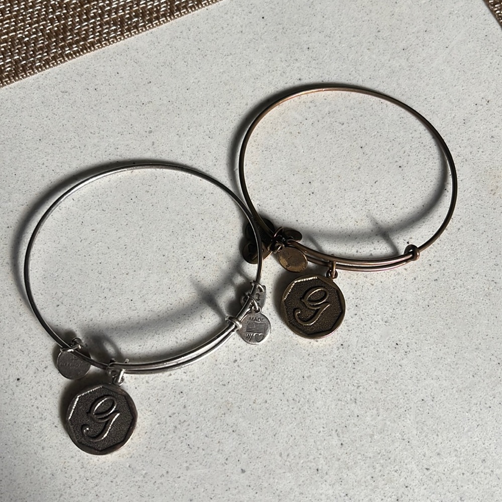 Two Alex and Ani “G” bracelets